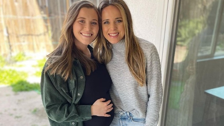 Joy-Anna Duggar Forsyth and Jinger Duggar Vuolo smiling