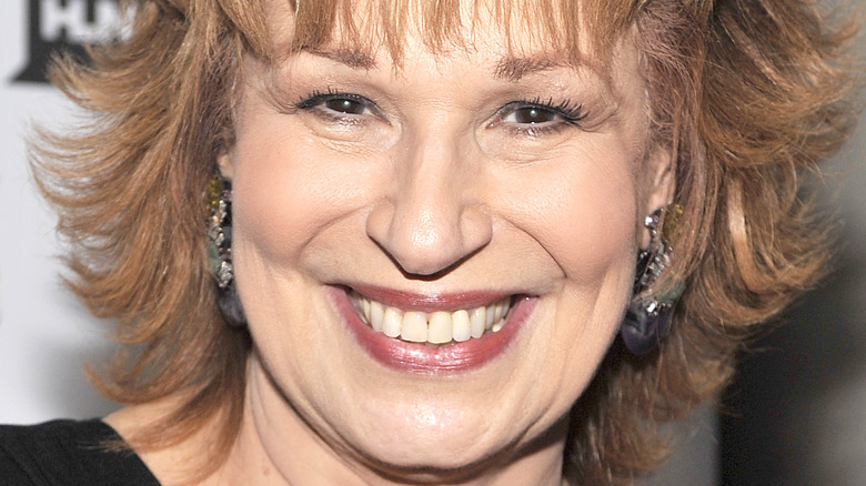 Joy Behar smiling on the red carpet