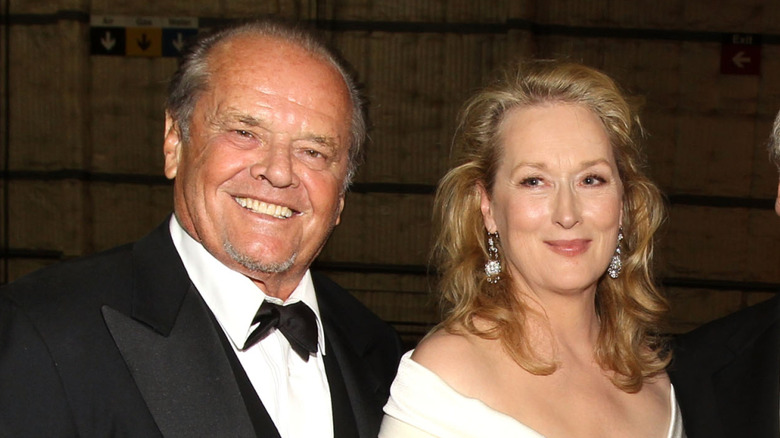 Jack Nicholson and Meryl Streep posing alongside each other