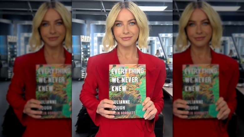 Julianne Hough wearing a red blazer and holding her book "Everything We Never Knew"
