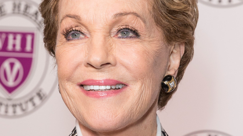 Julie Andrews smiling for photo