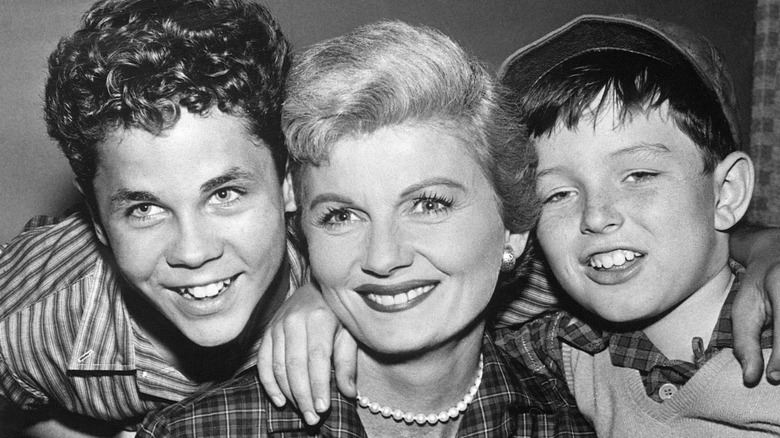 Tony Dow, Barbara Billingsley, and Jerry Mathers, stars of Leave It to Beaver, smiling