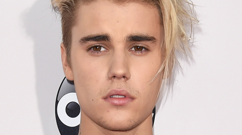 Justin Bieber poses on the red carpet