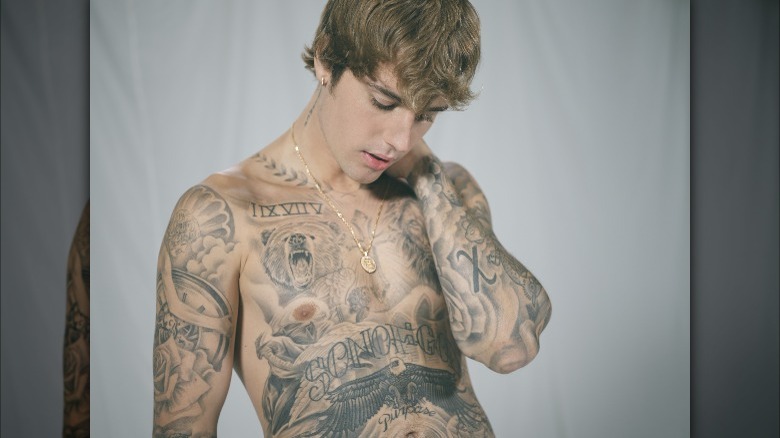 All Justin Bieber Tattoos With Meaning - YouTube