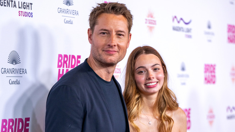 Justin Hartley posing with his daughter Isabella