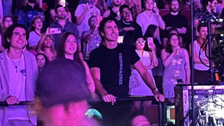 Justin Trudeau smiling among a crowd