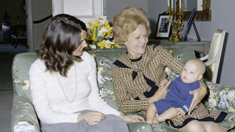Justin Trudeau as a baby being held by First Lady Pat Nixon in April 1972