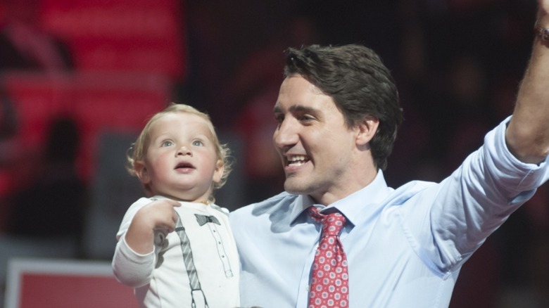 Justin Trudeau holding baby Hadrien Trudeau in 2015