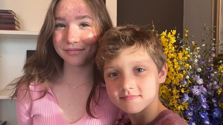 Ella-Grace Trudeau and Hadrien Trudeau smiling in pink shirts