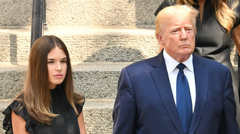 Donald Trump and his granddaughter Kai Trump