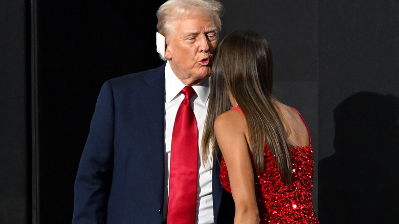 Kai Trump kisses Donald Trump