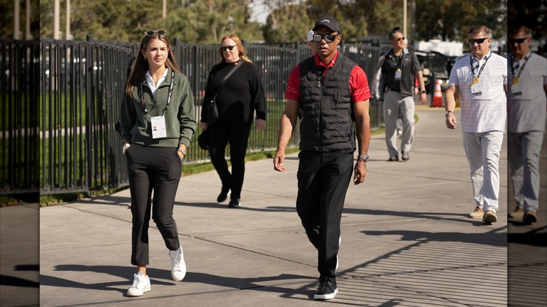 Kai Trump strolling with Tiger Woods