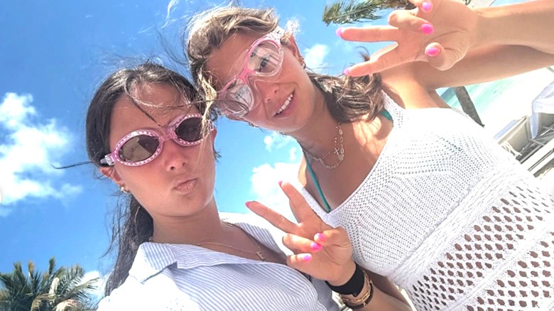 Emma Markin and Kai Trump taking a beach selfie
