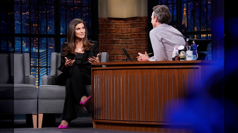 Kaitlan Collins talking to Seth Myers