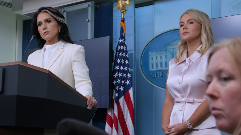 Tulsi Gabbard and Karoline Leavitt frowning