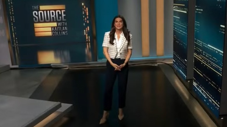 Kaitlan Collins speaking in cropped jacket