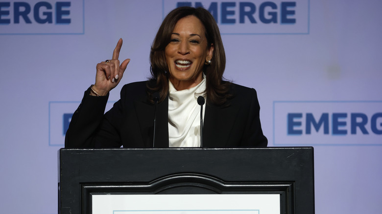 Former U.S. Vice President Kamala Harris speaking at a podium in April 2025.