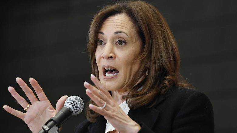 Kamala Harris speaking in a microphone
