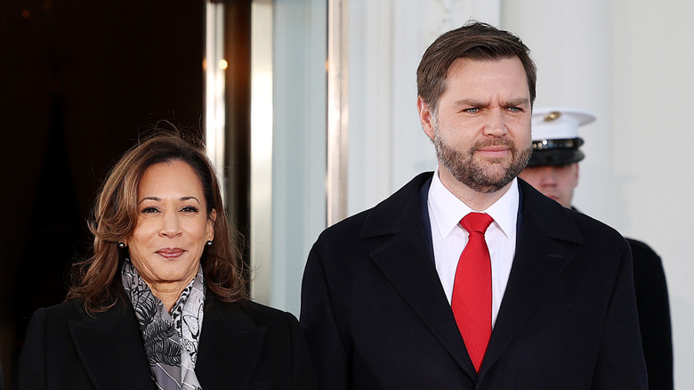 Kamala Harris stands next to JD Vance