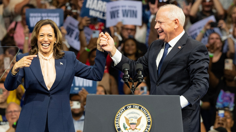 Kamala Harris and Tim Walz on stage at a rally in Philadelphia in August 2024