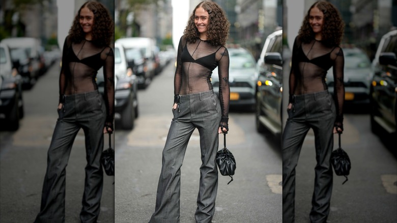 Ella Emhoff wearing a see-through net top and black brad