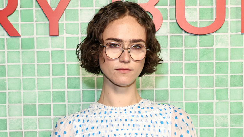 Ella Emhoff in front of green tiled wall