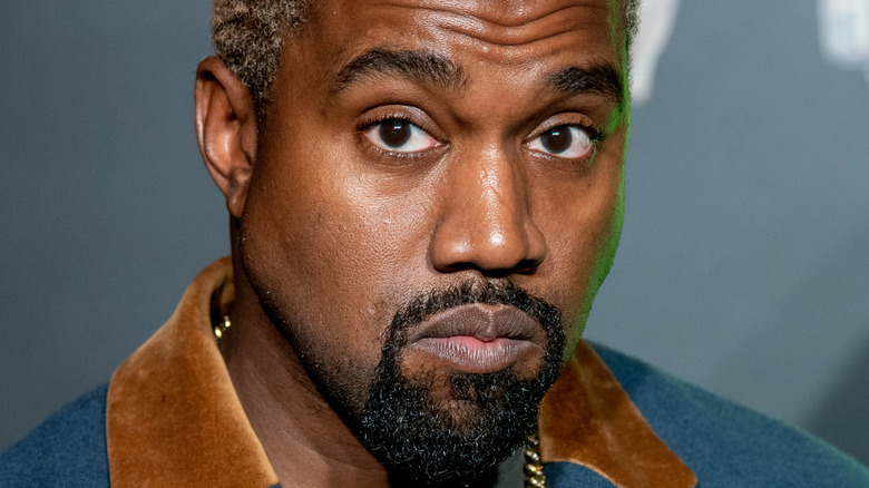 Kanye West looks despondent