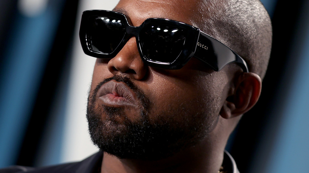 Kanye West with dark sunglasses