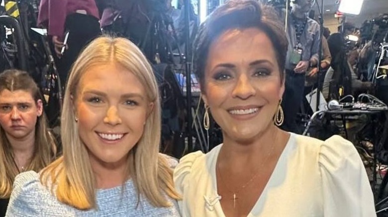 Karoline Leavitt and Kari Lake pose together in 2024