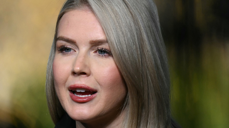 Close up on Karoline Leavitt with her mouth opened as she talks.