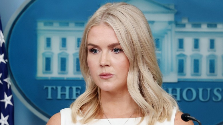 Karoline Leavitt listens to a question during a daily press briefing in the White House (2025)
