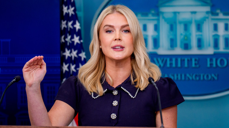 Karoline Leavitt listens to a question during a daily press briefing in the White House (2025)