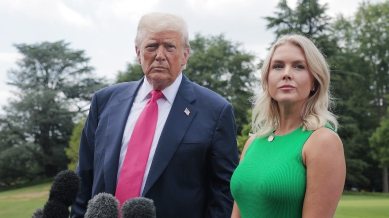 Donald Trump and Karoline Leavitt speak to the media on the White House lawn (2025)