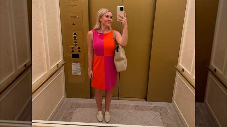 Karoline Leavitt smiling in mirror selfie