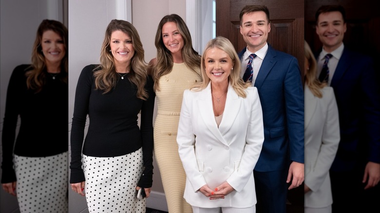 Karoline Leavitt smiling with a group of people