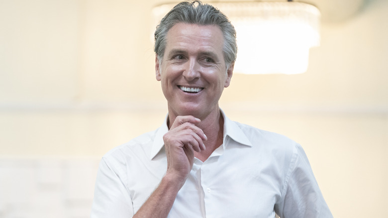 California Gov. Gavin Newsom smiles while speaking at Bella's Simple Occasions event space on July 8, 2025 in Bennettsville, South Carolina.