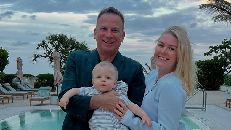 Karoline Leavitt poses with her husband and son by the pool