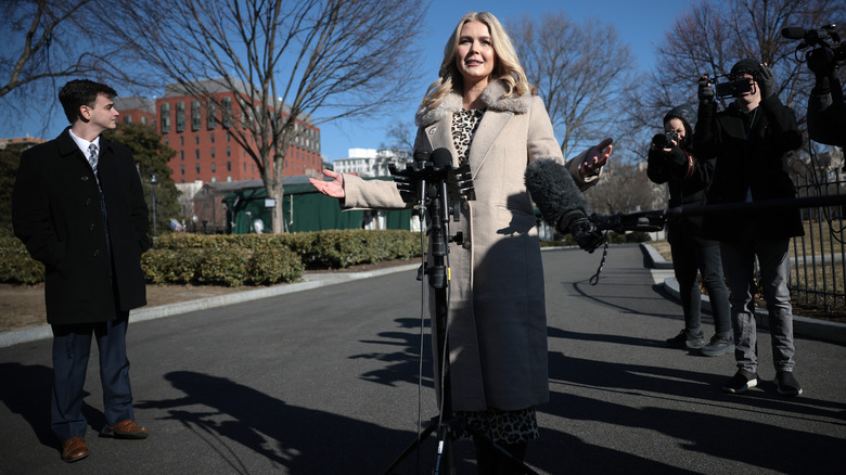 Karoline Leavitt wearing a gray coat