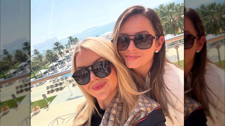 Karoline Leavitt and Margo Martin smiling and wearing sunglasses outdoors