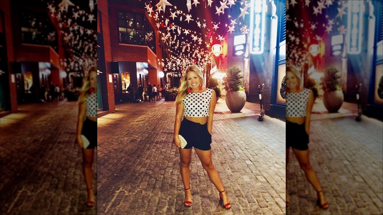 Karoline Leavitt poses outside