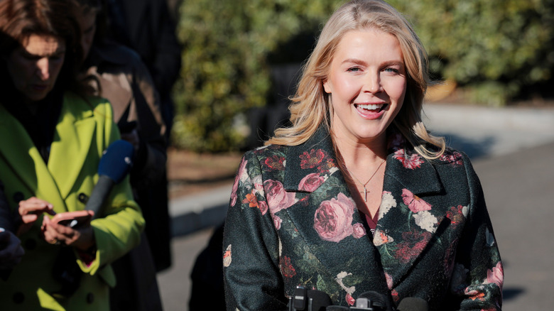 Karoline Leavitt speaks to reporters outside