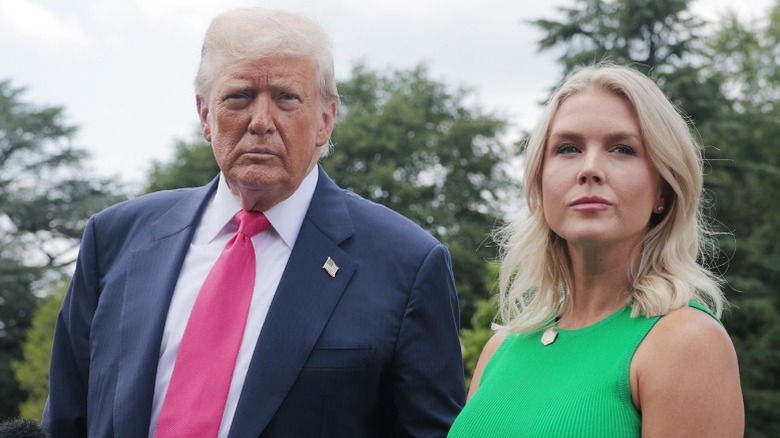 Donald Trump and Karoline Leavitt speak to the media in Washington, DC (2025)