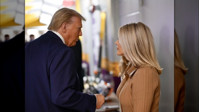 Donald Trump talking to Karoline Leavitt