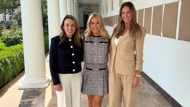 Meghan Bauer, Karoline Leavitt, and Margo Martin pose together at the White House (2025)