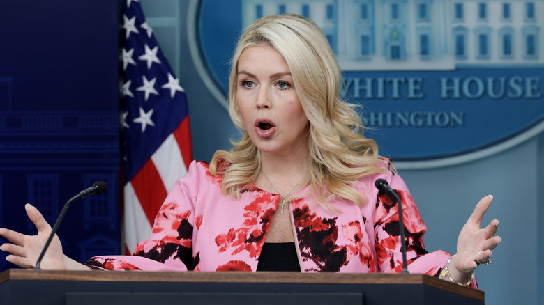 Karoline Leavitt speaking at podium