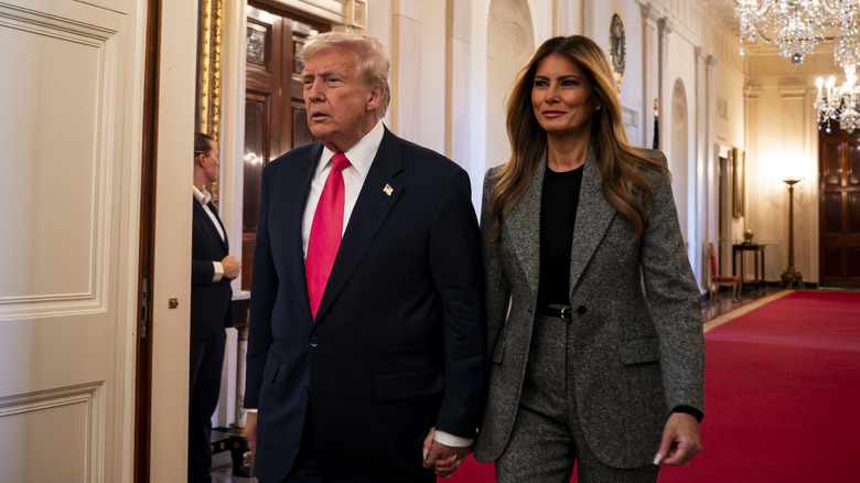 Donald and Melania Trump walking