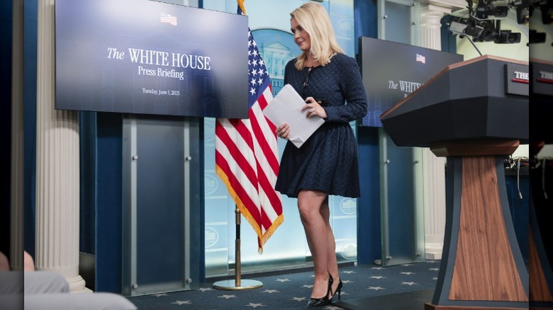 Karoline Leavitt departs after a press briefing in the White House (2025)
