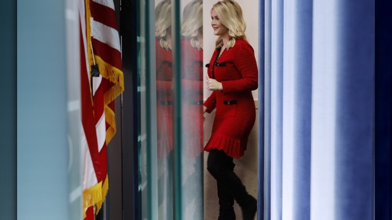 Karoline Leavitt walks into the Brady Press Briefing Room