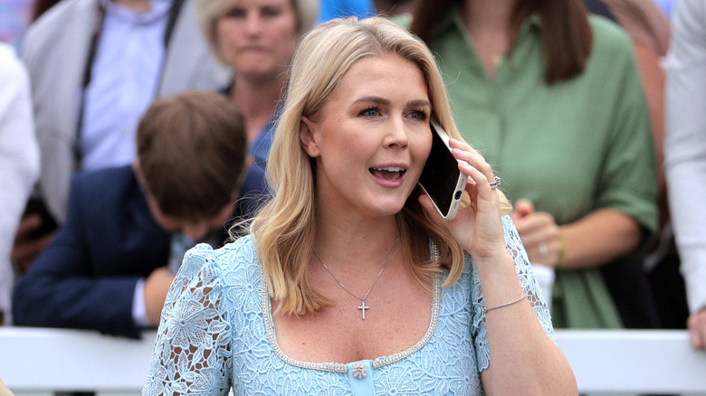 Karoline Leavitt talking on her cell phone