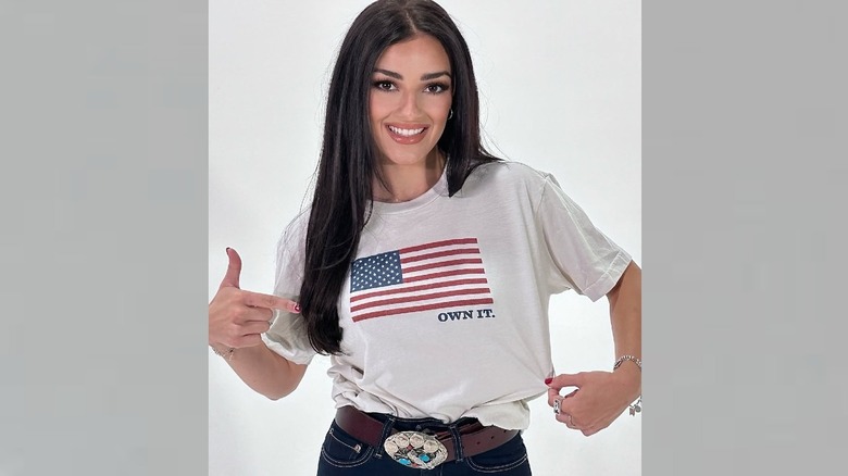 Alexis Wilkins sporting an American flag shirt.